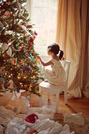 Christmas trees - mylusciouslife.com - child with christmas tree.jpg